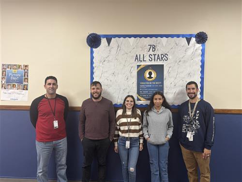 Ilianys Morales Rodriguez, Wilson's Stairclimber for October, poses with his award plaque.
